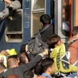 Imigranţi, tren